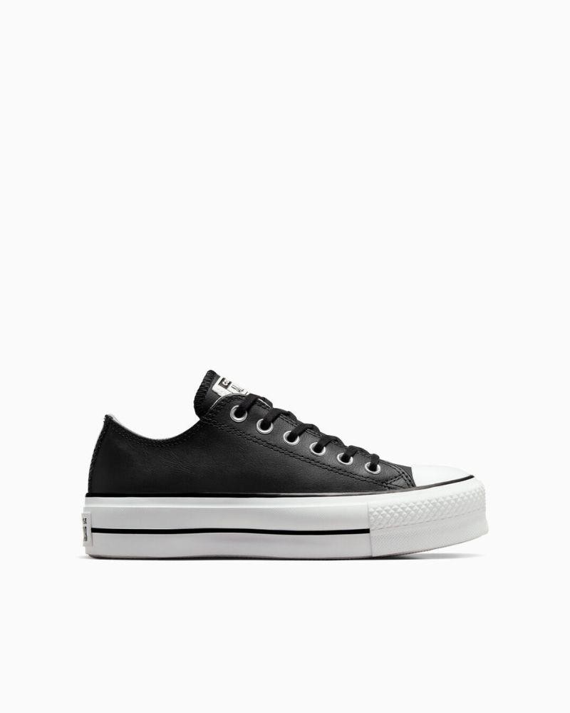 Desportivas femininas pretas Converse de pele Chuck Taylor